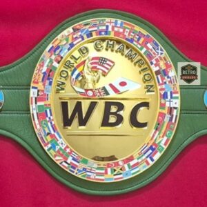 Replica WBC championship belt showing gold medallion and green leather strap