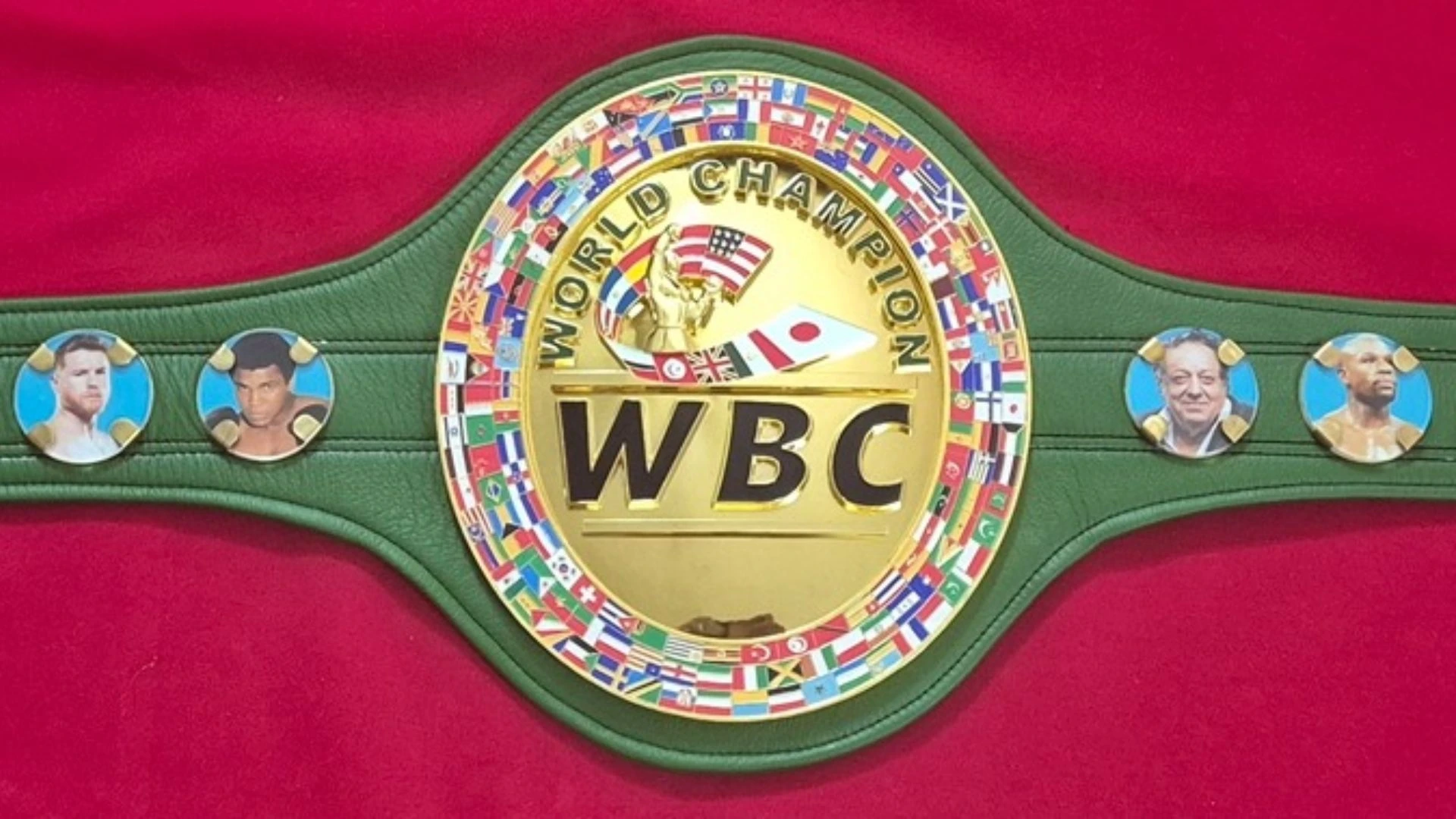 Katie Taylor next fight guide featured image showing a green and gold championship belt on a boxing ring canvas