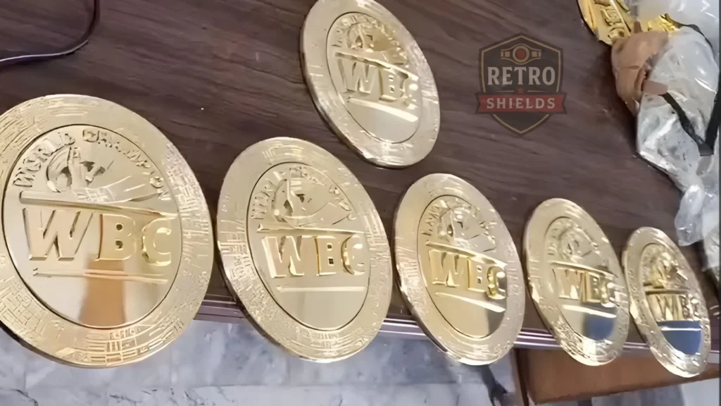Craftsman finishing a WBC replica belt in the Retro Shields workshop in Sialkot