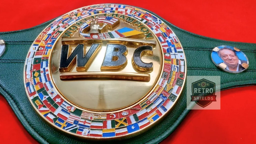 Close up of raised WORLD CHAMPION lettering on a Retro Shields WBC replica belt plate