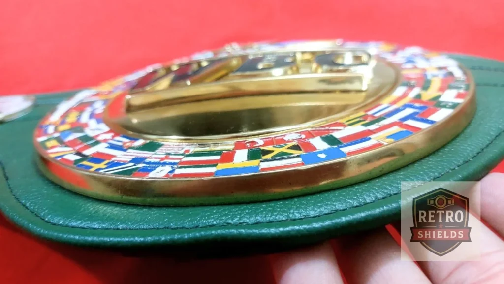 Retro Shields WBC replica belt on a scale with a tape measure along the strap