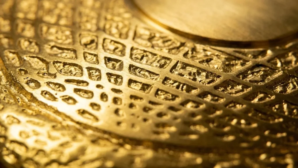 Engraving detail on the side plate of a championship belt